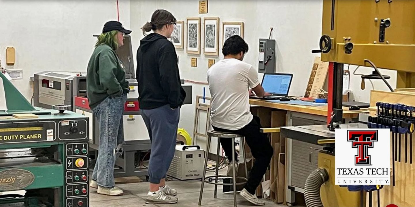 Laser TeamWork — students working with laser equipment in a classroom